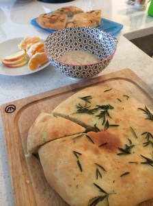 Pizza bread flavoured with garlic and thyme, and porridge for breakfast and school lunches